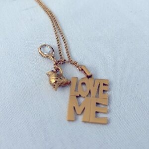 Juicy couture, “Love Me” Necklace with Charms gold tone finish